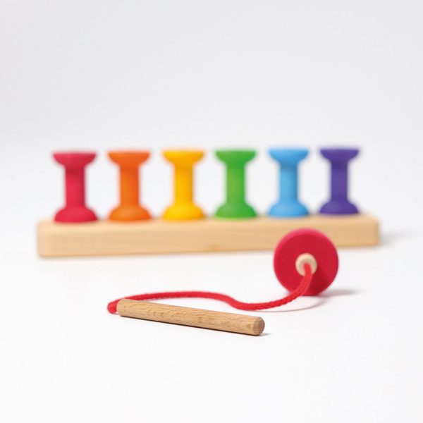 Gioco impilabile spolette arcobaleno con ago Grimm's