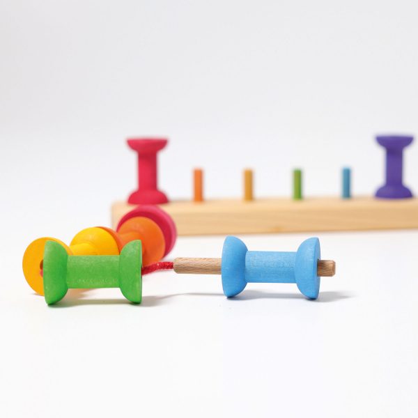 Gioco impilabile spolette arcobaleno con ago Grimm's