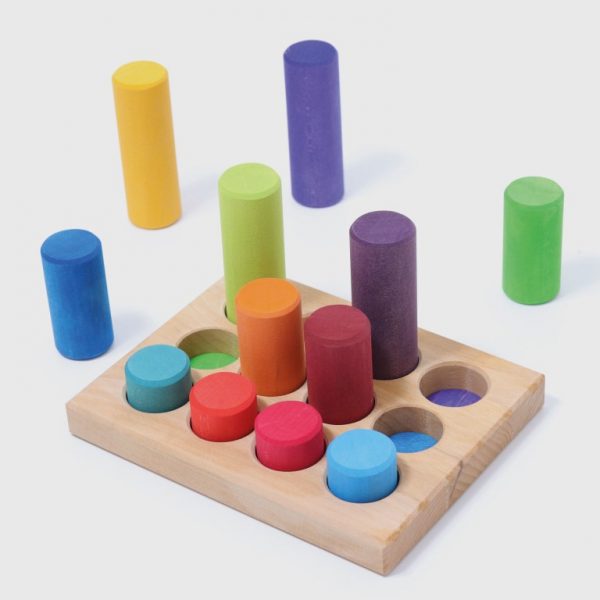 Gioco cilindri associazione colori primari Grimm's