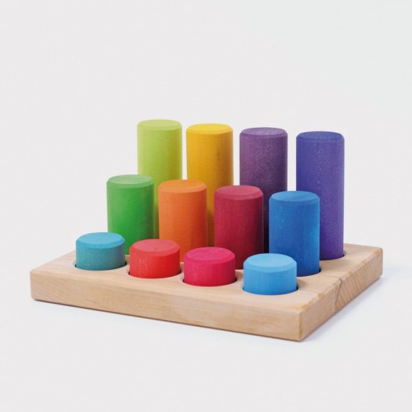 Gioco cilindri associazione colori primari Grimm's