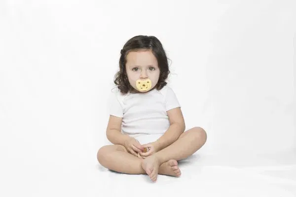 Ciuccio ortodontico in gomma naturale banana 3-36 mesi Hevea
